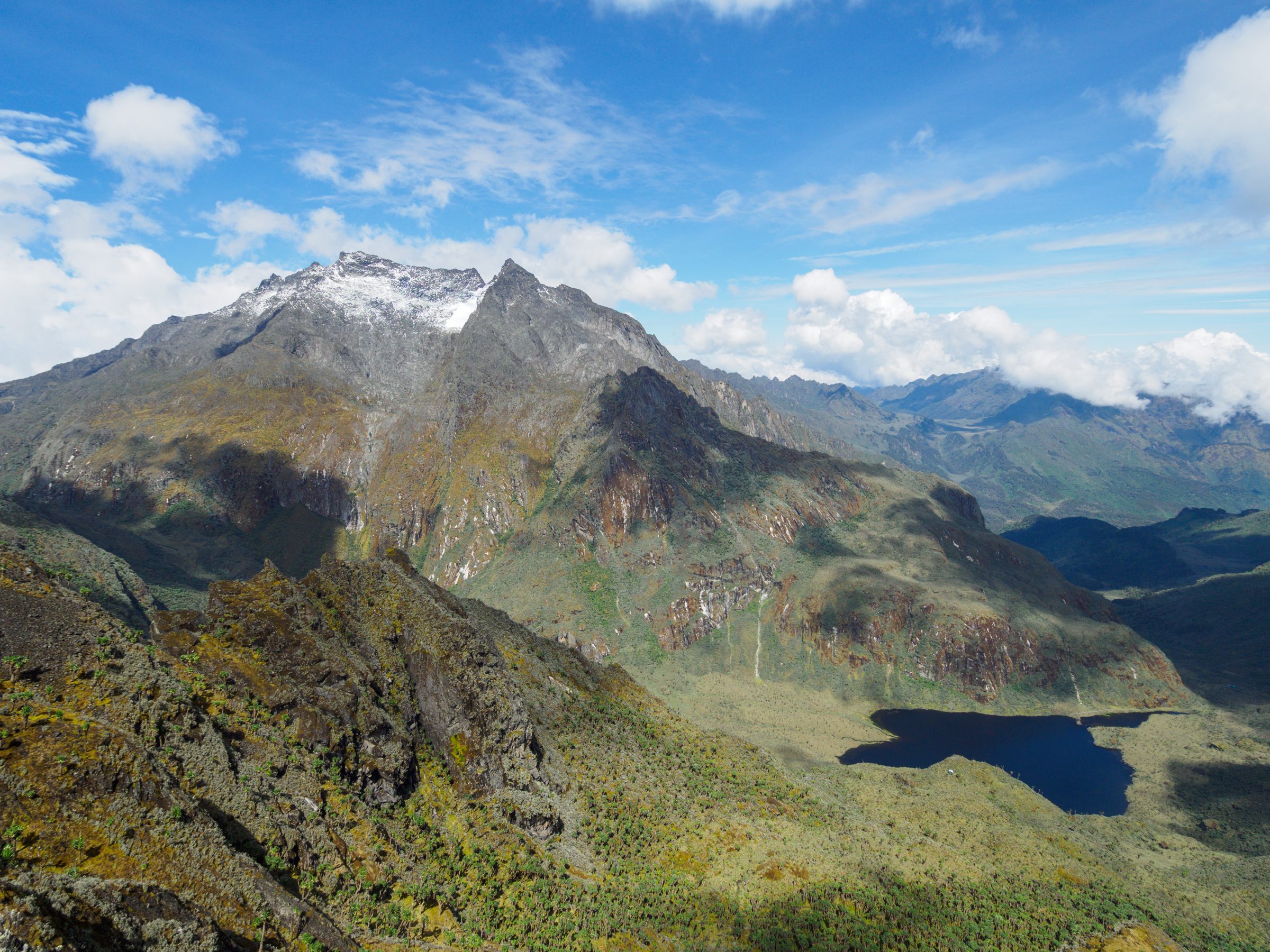 The snow-capped peaks of the Rwenzori Mountains rising above cloud in western Uganda